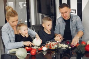 American family preparing a colorful balanced meal