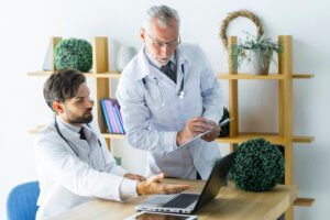 Physician discussing medically supervised weight management options with adult patient