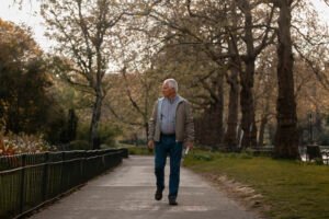 Adult walking outdoors during a stress relieving evening routine, American neighborhood